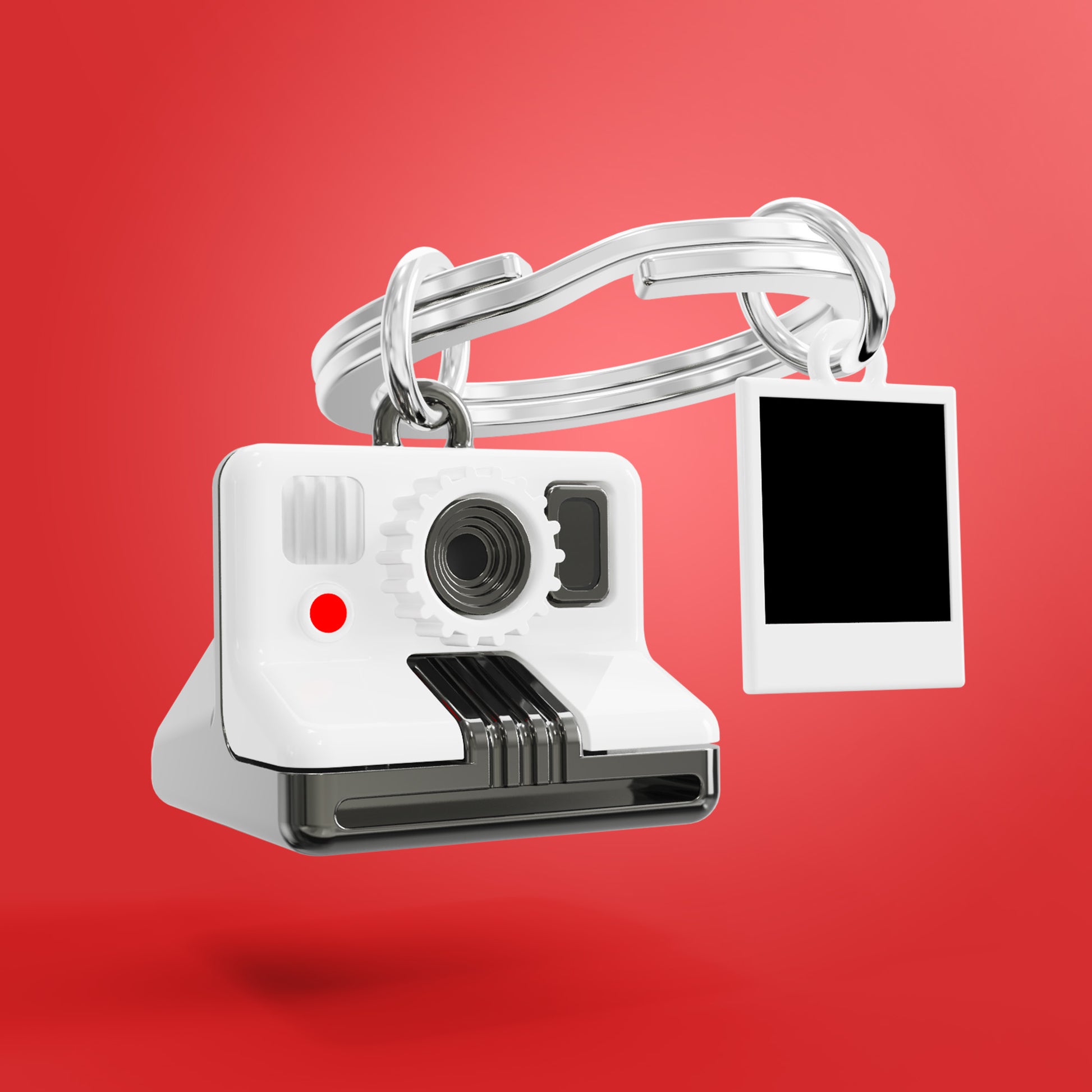 Metalmorphose® Sleutelhanger Instant Camera – Wit/Zwart – Camera Sleutelhanger - met rode achtergrond